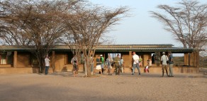 Scientists from around the world attend a conference at TBI's Turkwel research facility.